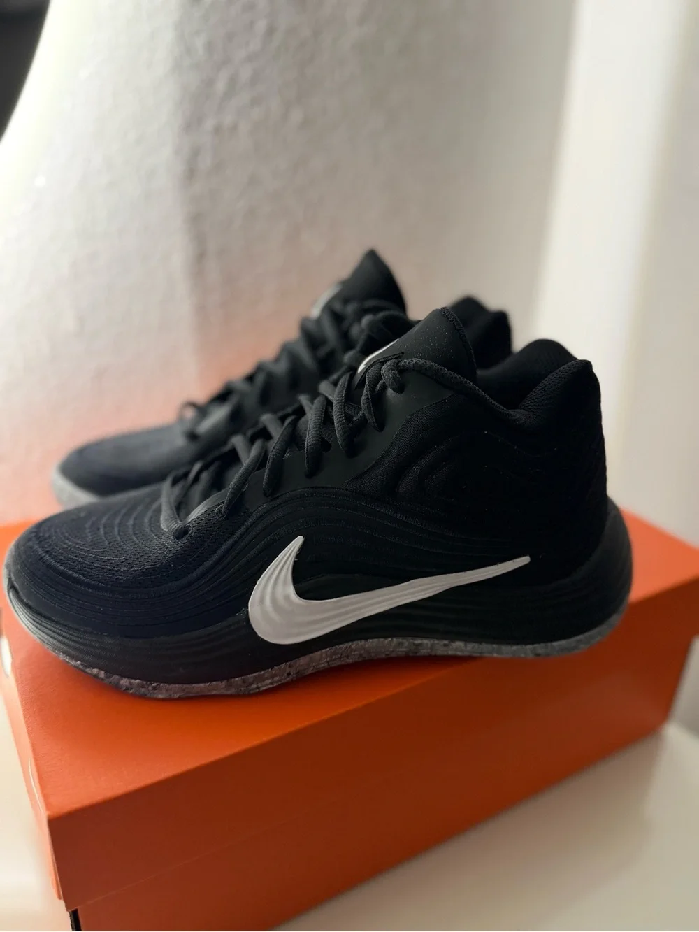 Nike Men’s Black Sneakers with White Swoosh